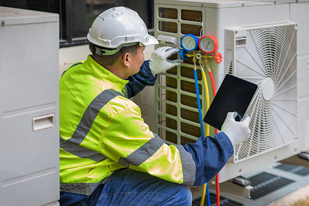 Professional Air Conditioning Repair technician working in Felt, ID